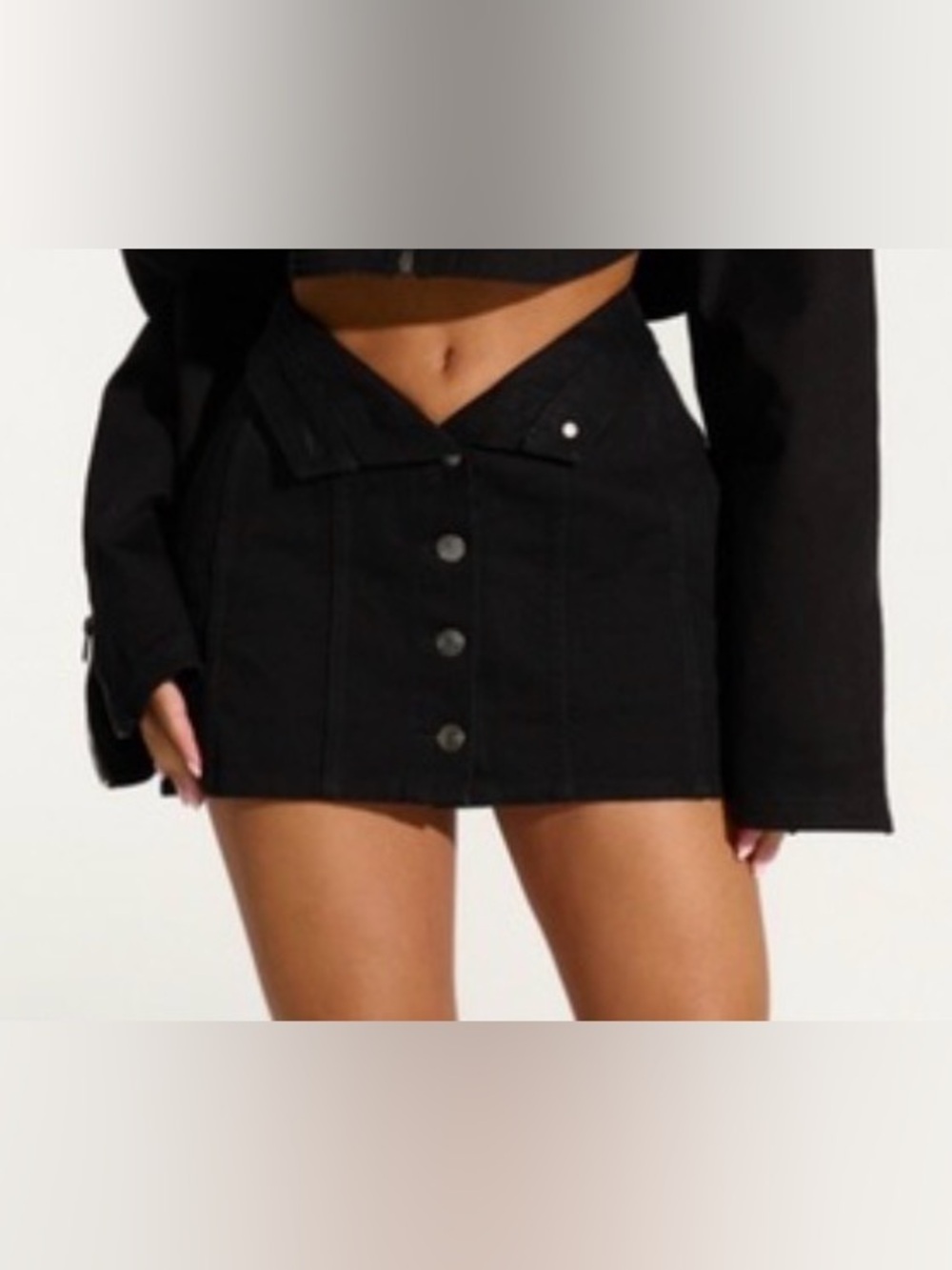 naked wardrobe Black Button-Front Asymmetrical Mini Skirt